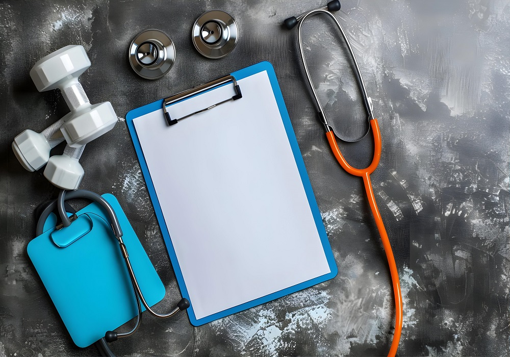 fitness-concept-with-stethoscope-clipboard